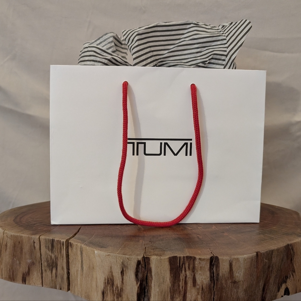 TUMI White Gift Bag with Red Handles
